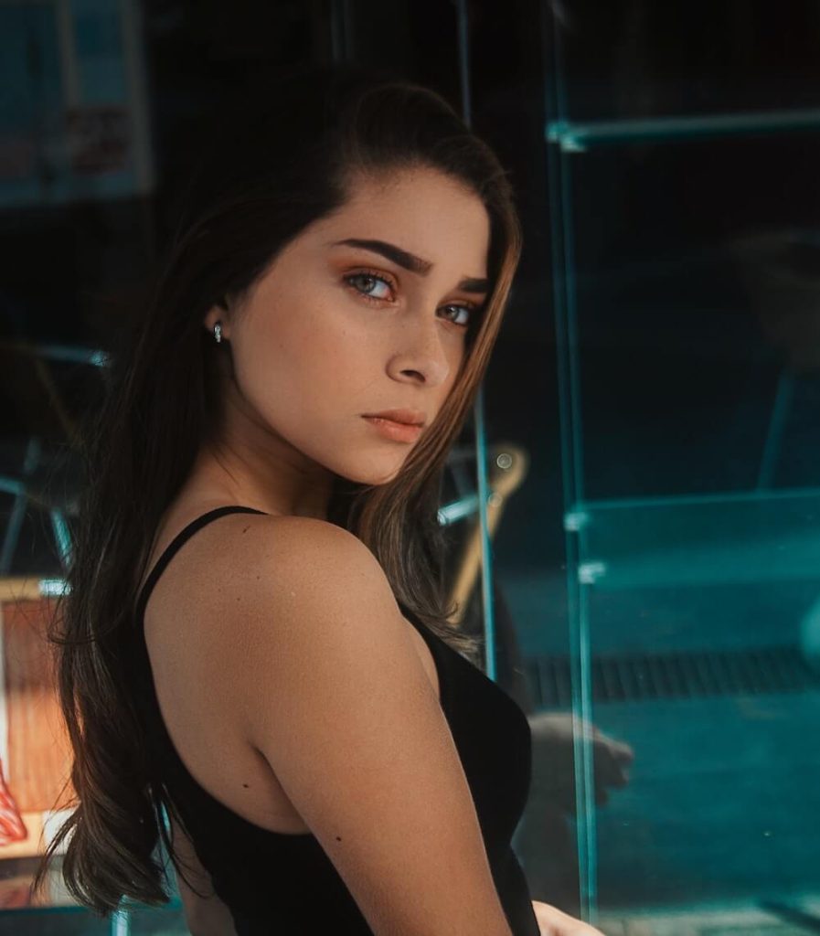 Woman looking at camera with no emotion